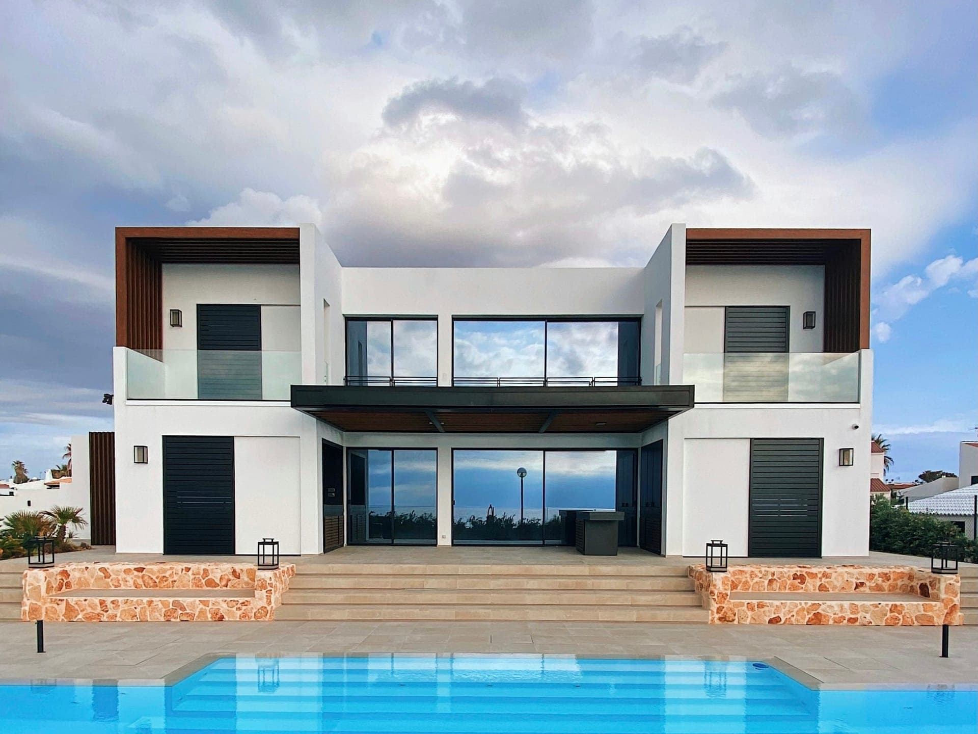 Luxury villa exterior with pool